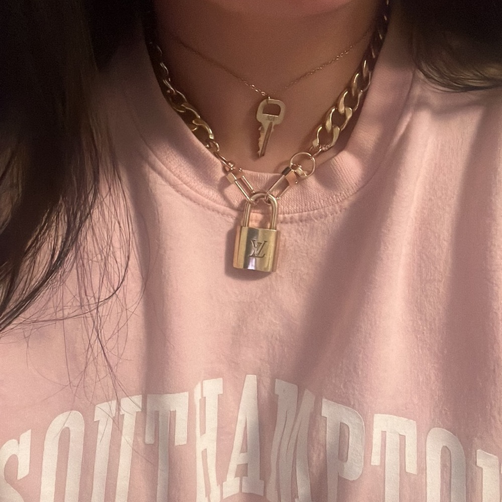 Authentic Louis Vuitton lock and key #301 on necklaces